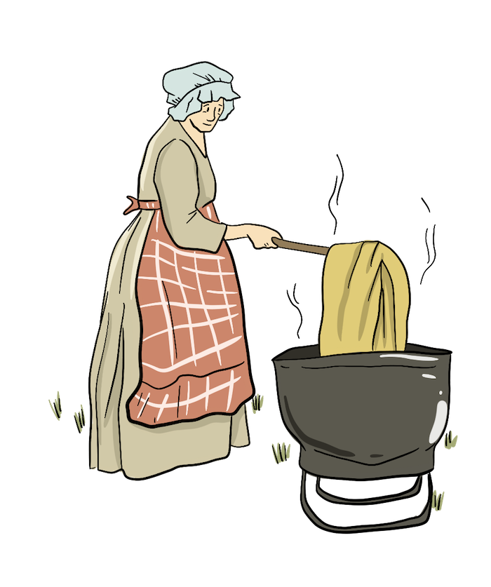 A woman is using a stick to put a piece of laundry into a very hot washbucket of water. 