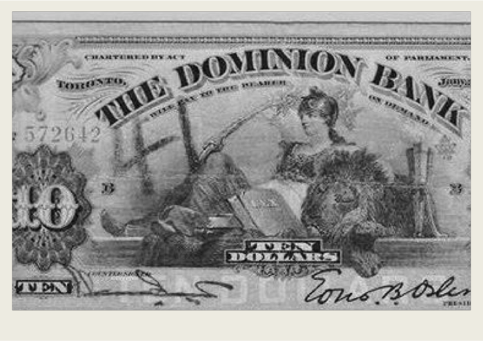 Photo caps-01 A pile of Canadian one hundred dollar bills are shown.