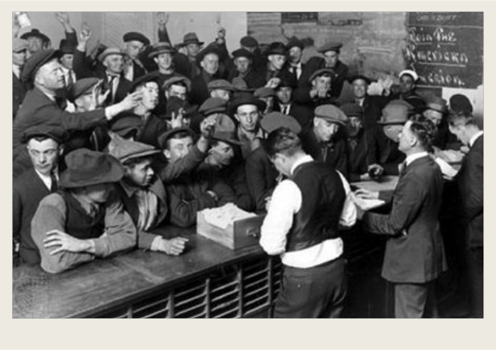 A group of men are working at a stock broker company.