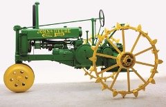 A yellow and green steel tractor is shown.