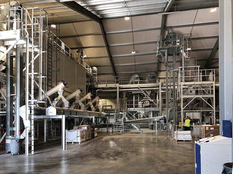 A barley processing facility is very large with a lot of specialized, food-safe equipment.