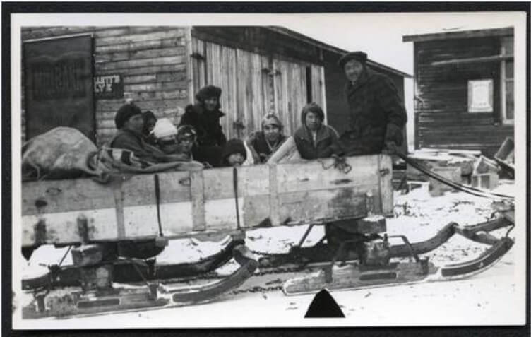 A piece of art by Leah Marie Dorion made with mosaics shows two Indigenous women facing each other with their hair blowing out behind them. There is a sun with butterflies in the centre, and snakes underneath the ground.