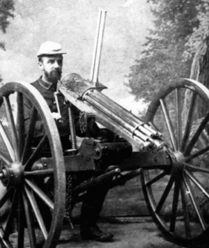 Photograph of pasta being made by putting dough through a hand-held pasta cutter.
