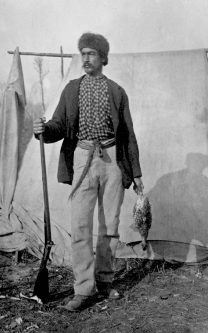 A piece of art by Leah Marie Dorion made with mosaics shows two Indigenous people standing near animals, sun, and water.